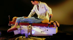 This is a picture of Cox Technic chiropratic spinal manipulation as performed at Dr. Butwell.